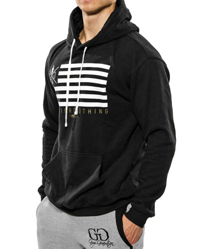 Schwarzer Gym Generation Hoodie mit Logo, goldener 'Warrior Clothing MMXIV'-Schrift und Kängurutasche.