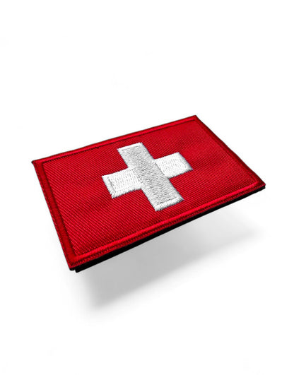 Schweizer Flagge Patch mit Klettverschluss – ein Symbol für Heimatliebe und Abenteuerlust, perfekt für Outdoor-Ausrüstung, Kleidung und Accessoires. Zeig deine Verbundenheit mit „Hopp Schwiiz“-Charme!