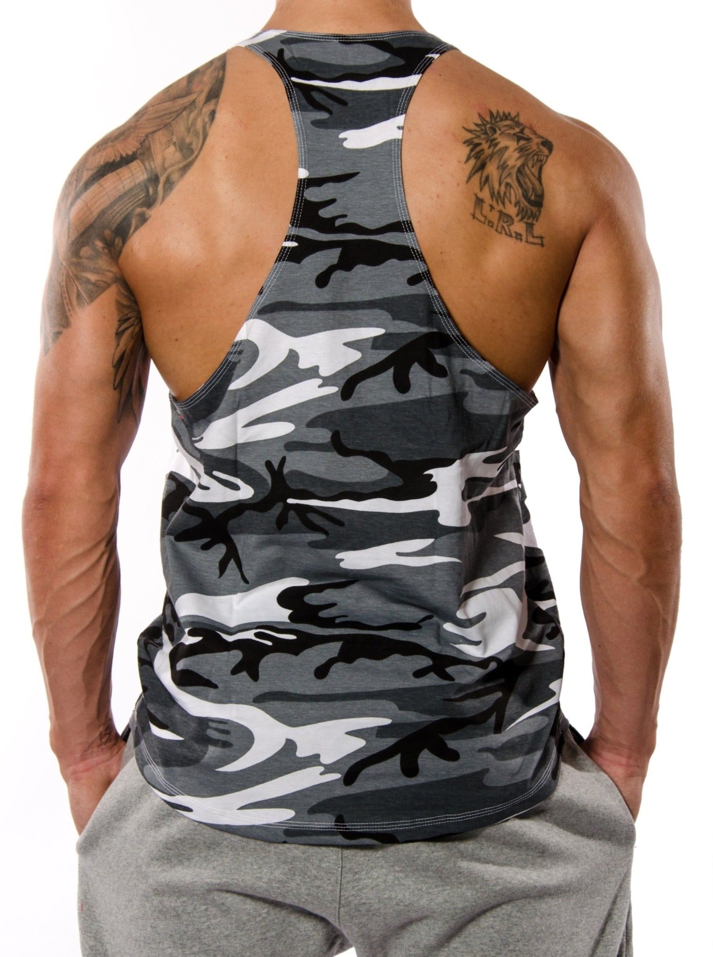 Back view of Gym Generation Stringer Tank Top in Camouflage pattern, showcasing racerback design and breathable material for gym workouts and bodybuilding.