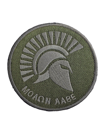 Molon Labe Patch in Olivgrün – robustes, rundes Patch mit Spartaner Helm und „Molon Labe“-Schriftzug, perfekt für Outdoor-Abenteuer und militärischen Look.