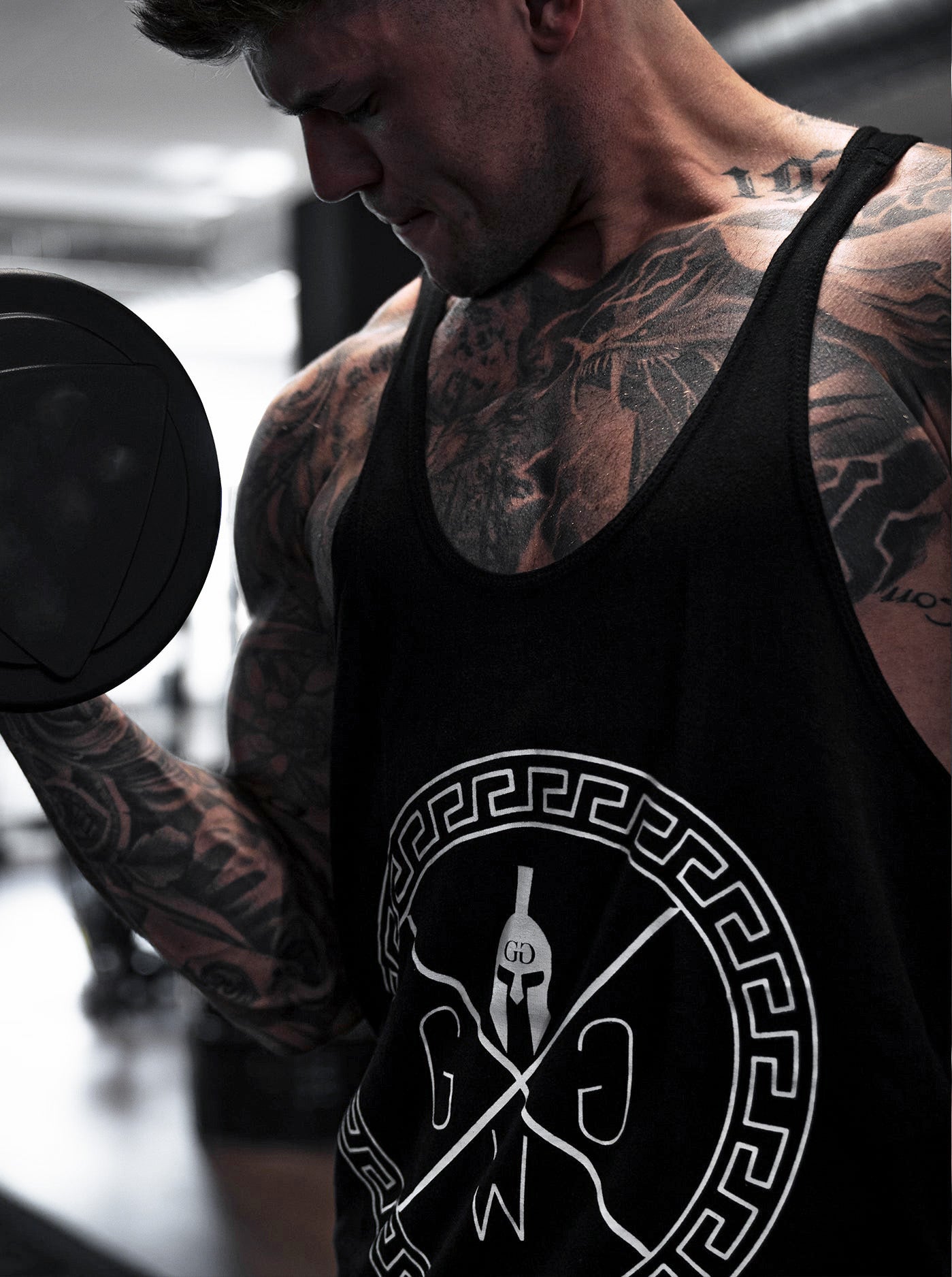 Spartaner-Logo Tank Top – Gym Generation Stringer, für Männer, die Stärke und Disziplin zeigen wollen, perfekt für Training und Freizeit.